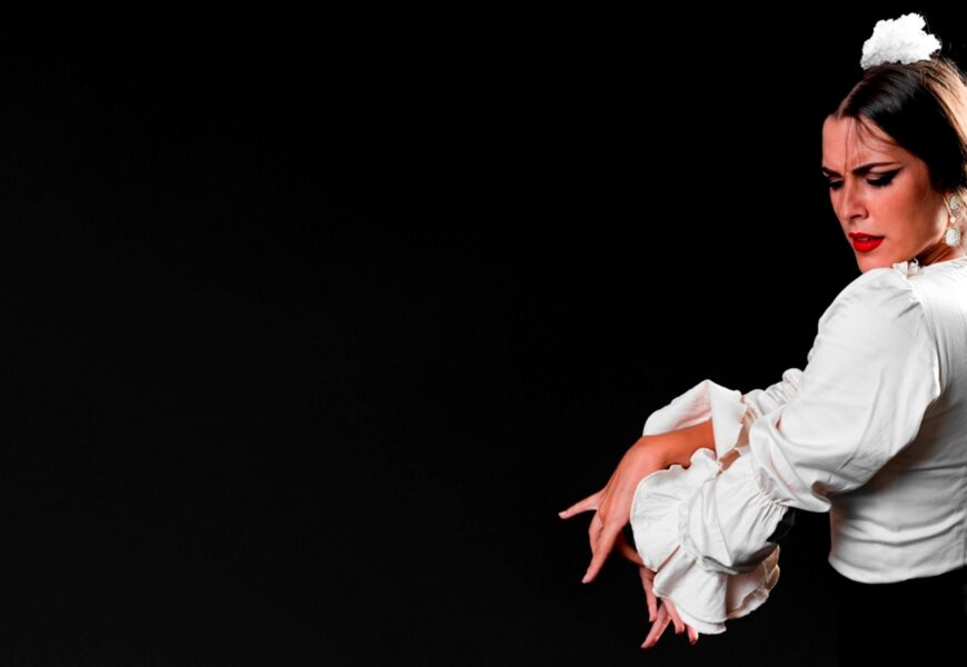 Woman dancing flamenco with copy space